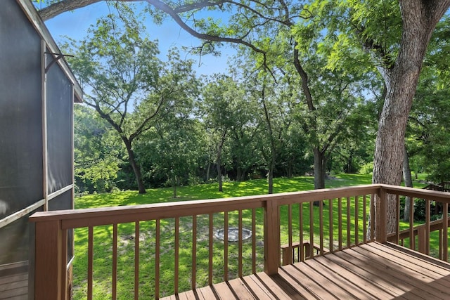 11915 River Oaks Trl, Austin, TX 78753 - wooden terrace featuring a lawn and view of scattered trees