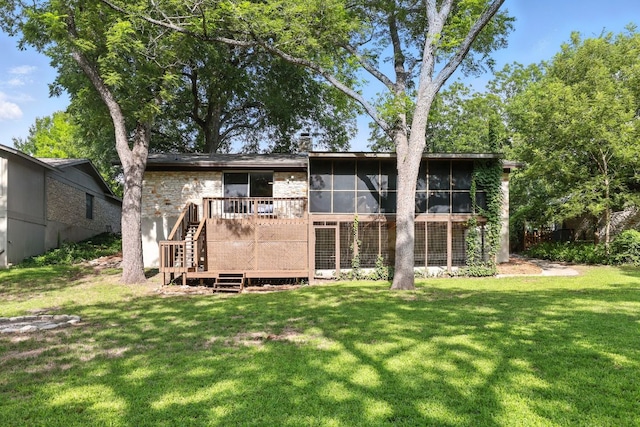 11915 River Oaks Trl, Austin, TX 78753 - rear view of house with a yard, a sunroom, a wooden deck, and stairs