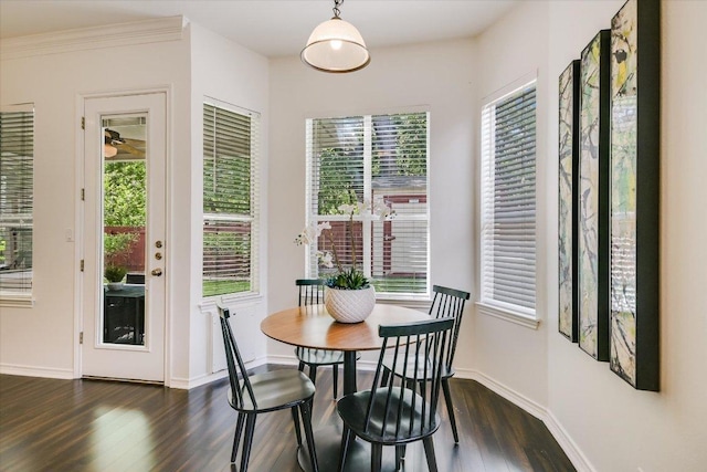 2211 Wilson St, Austin, TX 78704 - dining area with dark wood-style flooring and baseboards
