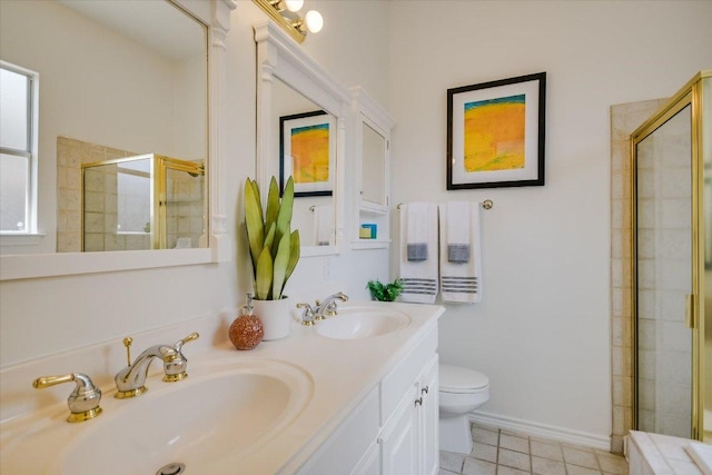 2211 Wilson St, Austin, TX 78704 - bathroom featuring a tile shower, double vanity, and tile patterned flooring