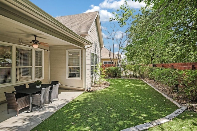 2211 Wilson St, Austin, TX 78704 - fenced backyard featuring ceiling fan and a patio area