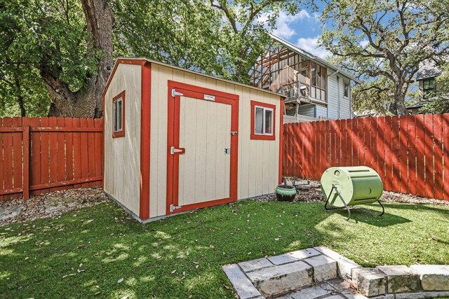 2211 Wilson St, Austin, TX 78704 - view of shed featuring a fenced backyard