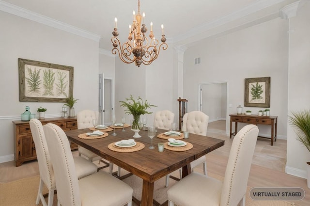 12304 Buvana Dr, Austin, TX 78739 - dining room featuring a chandelier, crown molding, a high ceiling, and light wood-style flooring