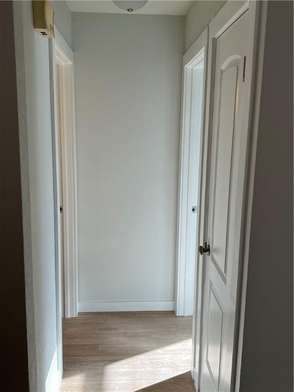 5802 Cherry Park, Austin, TX 78745 - hallway featuring wood finished floors and baseboards