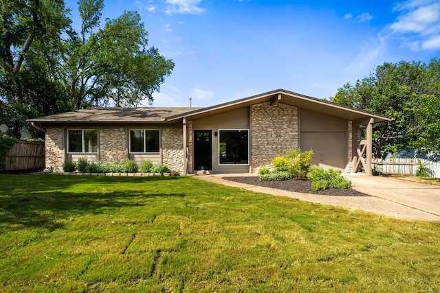 3005 Susquehanna Ln, Austin, TX 78723 - view of front of property featuring stone siding, concrete driveway, and a garage