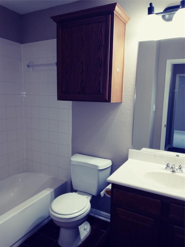 3304 Wickham Ln, Austin, TX 78725 - full bath with vanity, tile patterned floors, and shower / washtub combination