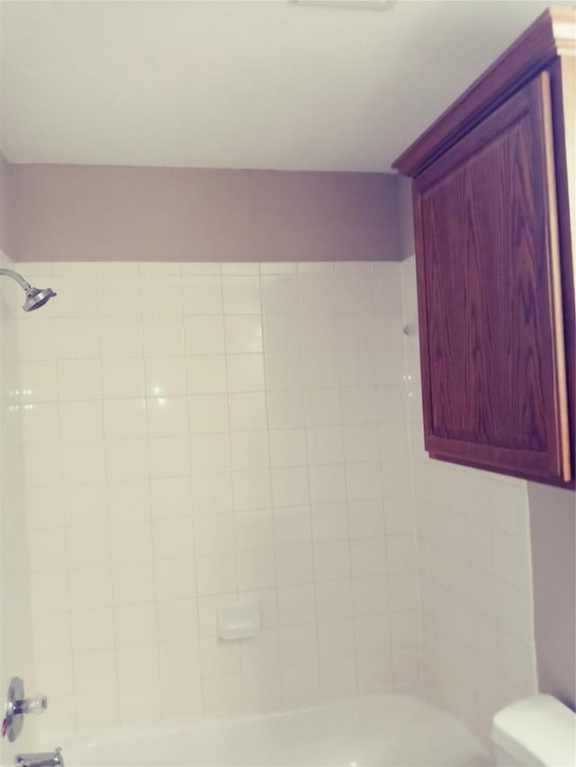 3304 Wickham Ln, Austin, TX 78725 - bathroom with toilet and washtub / shower combination