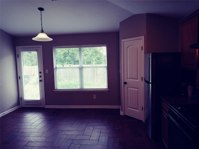 3304 Wickham Ln, Austin, TX 78725 - kitchen with electric range, pendant lighting, and vaulted ceiling