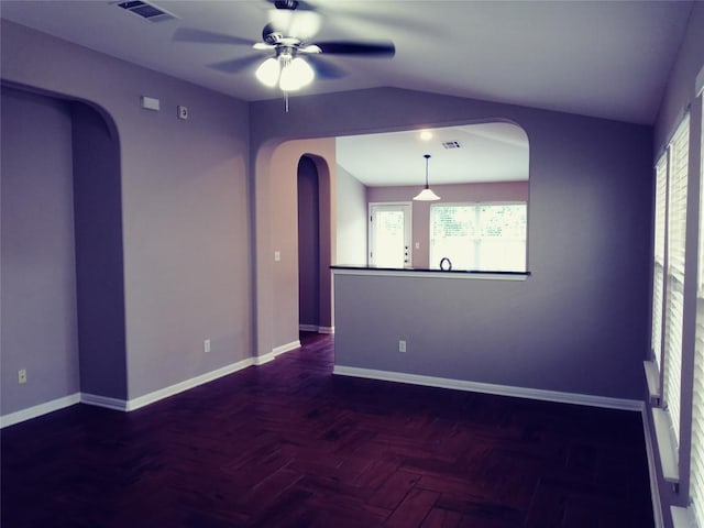 3304 Wickham Ln, Austin, TX 78725 - unfurnished room with arched walkways, healthy amount of natural light, and ceiling fan