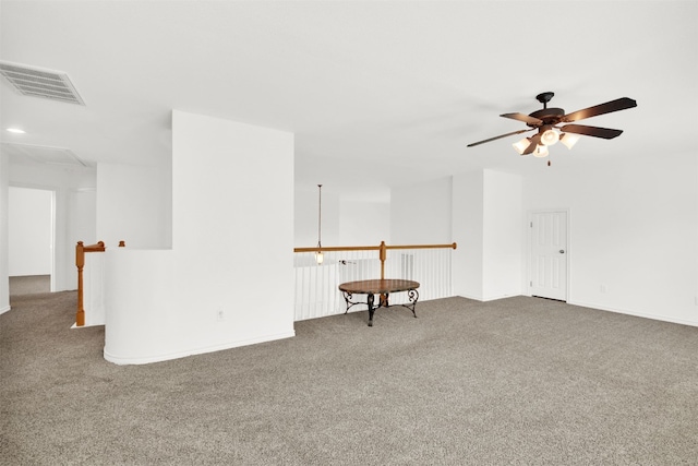 2310 Dervingham Dr, Cedar Park, TX 78613 - spare room featuring carpet flooring, ceiling fan, and attic access