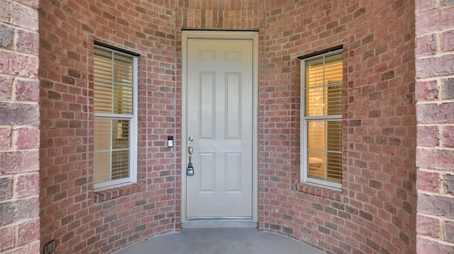 2310 Dervingham Dr, Cedar Park, TX 78613 - view of exterior entry featuring brick siding