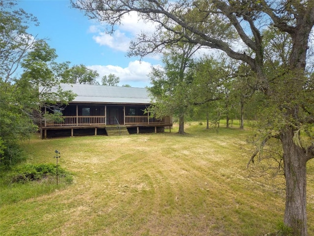 2874 Fm 1704, Elgin, TX 78621 - view of grassy yard featuring a deck