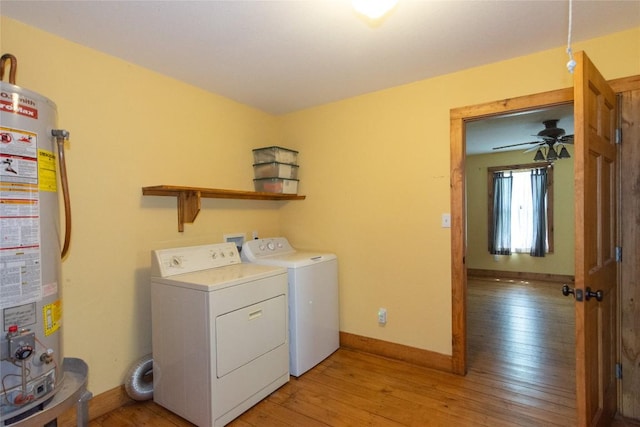 2874 Fm 1704, Elgin, TX 78621 - laundry area featuring water heater, separate washer and dryer, and light wood-style floors
