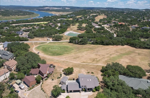 4705 Comanche, Lago Vista, TX 78645 - aerial view of property and surrounding area featuring nearby suburban area and a large body of water