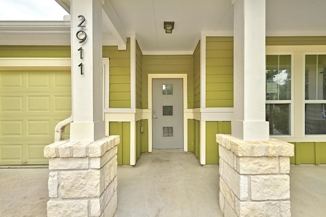 2911 Pops Way Unit 50, Austin, TX 78745 - entrance to property featuring a garage and covered porch