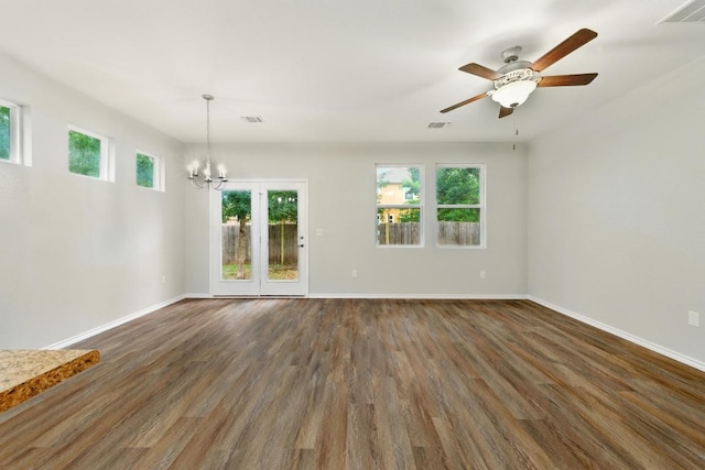 2911 Pops Way Unit 50, Austin, TX 78745 - unfurnished room featuring a chandelier, wood finished floors, and ceiling fan
