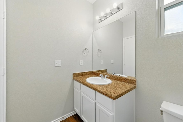 2911 Pops Way Unit 50, Austin, TX 78745 - bathroom featuring vanity and a textured wall
