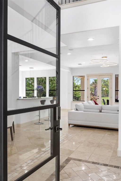 206 Lido St, Austin, TX 78734 - living room featuring french doors, a chandelier, and recessed lighting