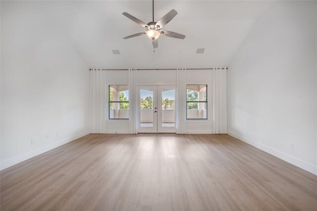 206 Lido St, Austin, TX 78734 - spare room with lofted ceiling, french doors, ceiling fan, and wood finished floors