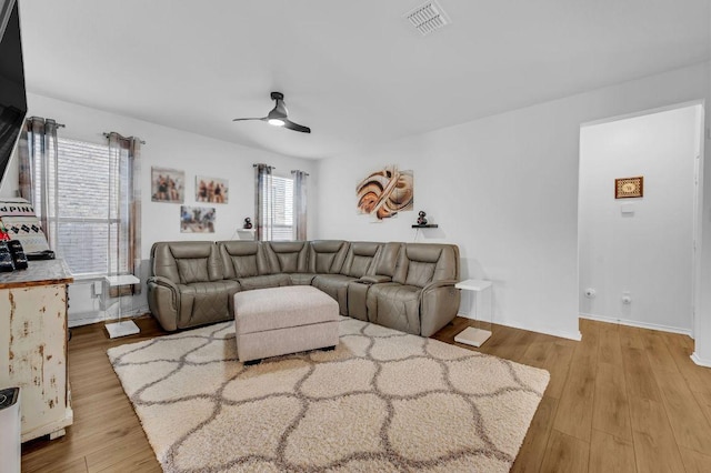 4909 Teverola Dr, Round Rock, TX 78665 - living room with ceiling fan and light wood-type flooring