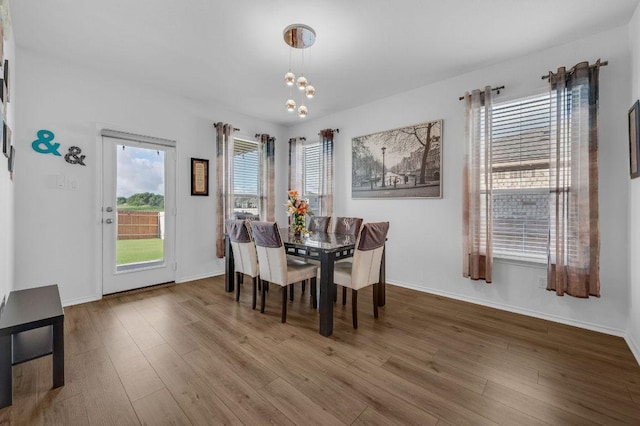 4909 Teverola Dr, Round Rock, TX 78665 - dining space with wood finished floors and a chandelier