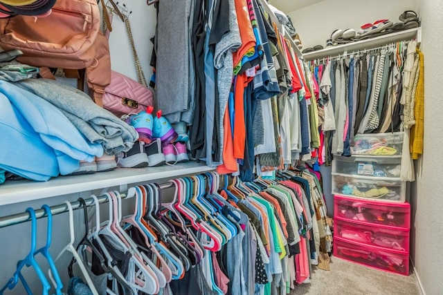 4909 Teverola Dr, Round Rock, TX 78665 - walk in closet featuring carpet