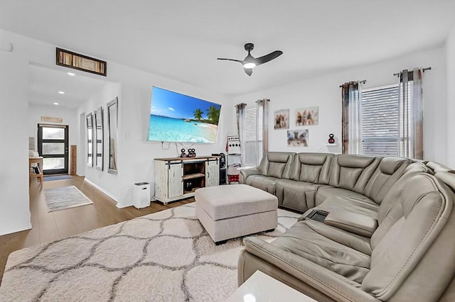 4909 Teverola Dr, Round Rock, TX 78665 - living area featuring ceiling fan, wood finished floors, and recessed lighting
