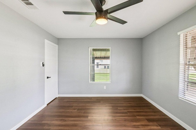 755 E Bellville St, Giddings, TX 78942 - spare room with wood finished floors and a ceiling fan