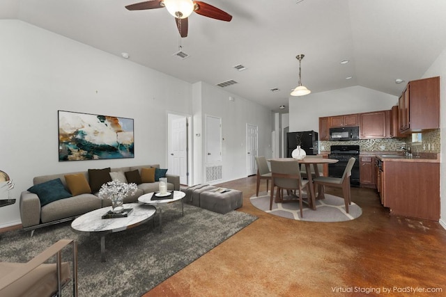 15300 Lucian St, Austin, TX 78725 - living area featuring a ceiling fan and high vaulted ceiling
