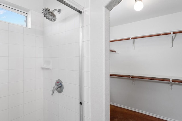 15300 Lucian St, Austin, TX 78725 - bathroom featuring a shower stall and a walk in closet