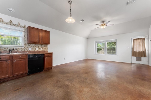 15300 Lucian St, Austin, TX 78725 - kitchen with black dishwasher, concrete floors, ceiling fan, vaulted ceiling, and open floor plan