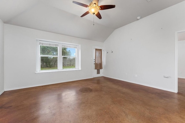 15300 Lucian St, Austin, TX 78725 - spare room featuring vaulted ceiling, ceiling fan, and concrete flooring
