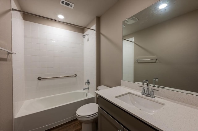 124 Ballyneal Ln, San Marcos, TX 78666 - full bath featuring vanity, shower / bathtub combination, wood finished floors, and recessed lighting