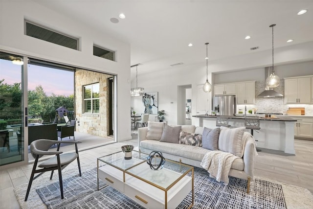 405 Maialina Cv, Lakeway, TX 78738 - living area with recessed lighting and light wood-style floors