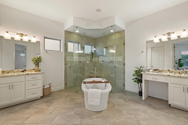 405 Maialina Cv, Lakeway, TX 78738 - full bath with a shower stall, two vanities, and a soaking tub
