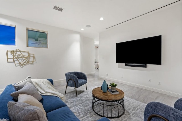 405 Maialina Cv, Lakeway, TX 78738 - living room featuring wood finished floors and recessed lighting