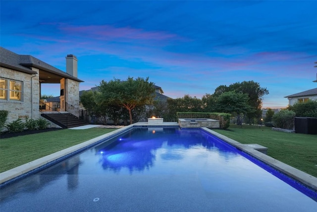 405 Maialina Cv, Lakeway, TX 78738 - view of swimming pool with stairs, a lawn, and an in-ground hot tub