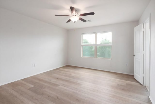 10205 Gertrudis Loop, Austin, TX 78747 - spare room featuring a ceiling fan and light wood-style flooring