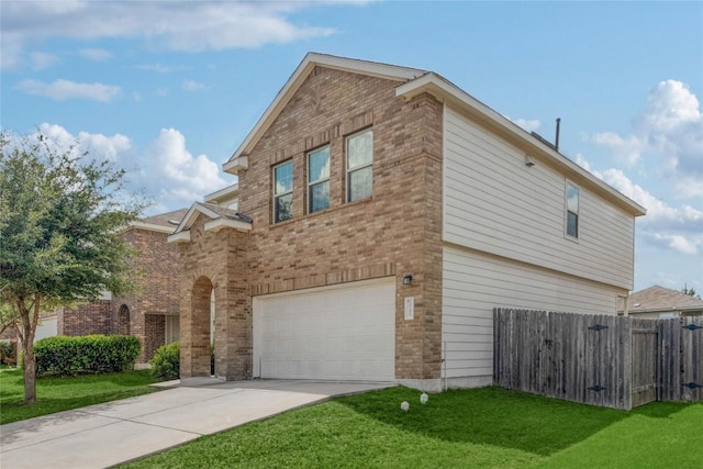 10205 Gertrudis Loop, Austin, TX 78747 - view of home's exterior with a garage, driveway, and brick siding