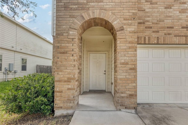 10205 Gertrudis Loop, Austin, TX 78747 - entrance to property with brick siding and a garage