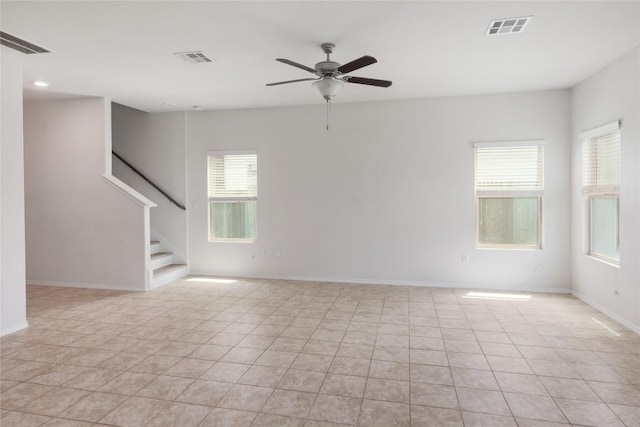 10205 Gertrudis Loop, Austin, TX 78747 - empty room featuring ceiling fan, stairway, light tile patterned flooring, and recessed lighting