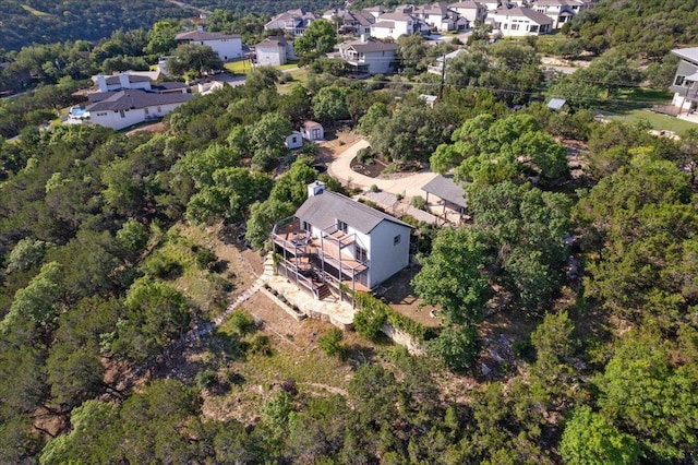 19426 Fisher Ln, Spicewood, TX 78669 - aerial overview of property's location featuring nearby suburban area and a heavily wooded area