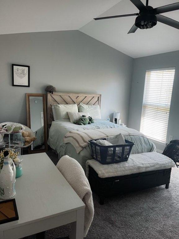 1725 Harvey Mitchell Pkwy S Unit 225, College Station, TX 77840 - carpeted bedroom with vaulted ceiling and a ceiling fan