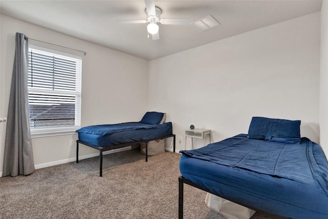 202 Grapefruit Rd, Hutto, TX 78634 - carpeted bedroom featuring baseboards and ceiling fan