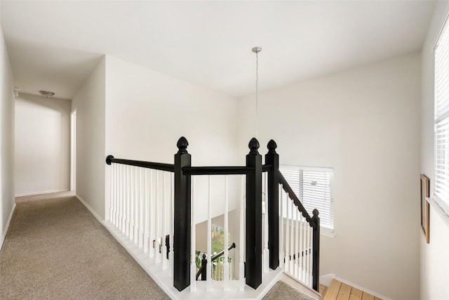 903 Thackeray Ln, Pflugerville, TX 78660 - corridor with an upstairs landing and a chandelier