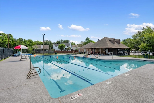 903 Thackeray Ln, Pflugerville, TX 78660 - community pool with a patio area
