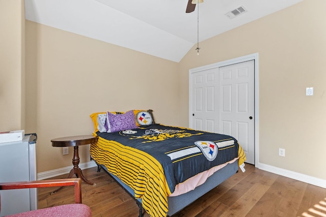 3604 Rosalina Loop, Round Rock, TX 78665 - bedroom featuring wood finished floors, lofted ceiling, a closet, and ceiling fan