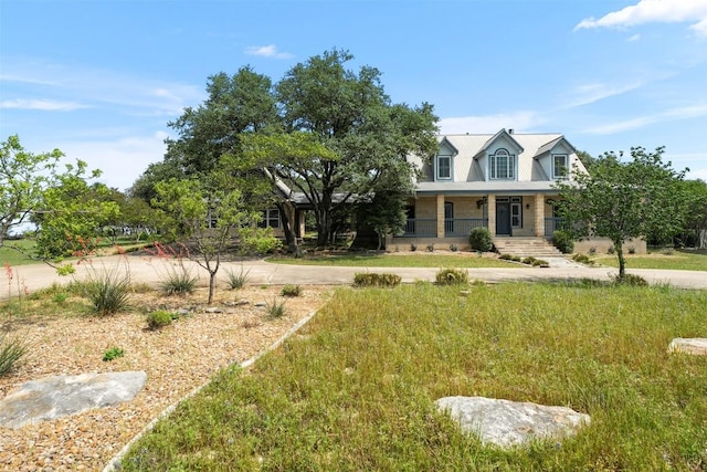 310 County Road 317, Georgetown, TX 78626 - view of front of house featuring covered porch and driveway