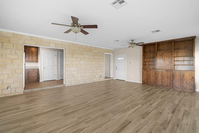 310 County Road 317, Georgetown, TX 78626 - unfurnished room with a ceiling fan, light wood-style floors, and ornamental molding