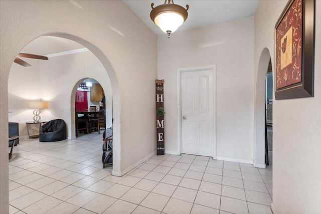 909 W 3rd St, Taylor, TX 76574 - entryway featuring arched walkways and light tile patterned flooring